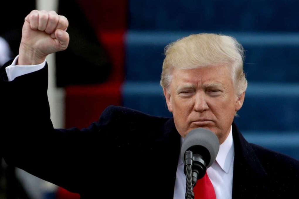 President Donald Trump raises a fist after his inauguration on the West Front of the US Capitol in Washington, DC. Photo: AFP