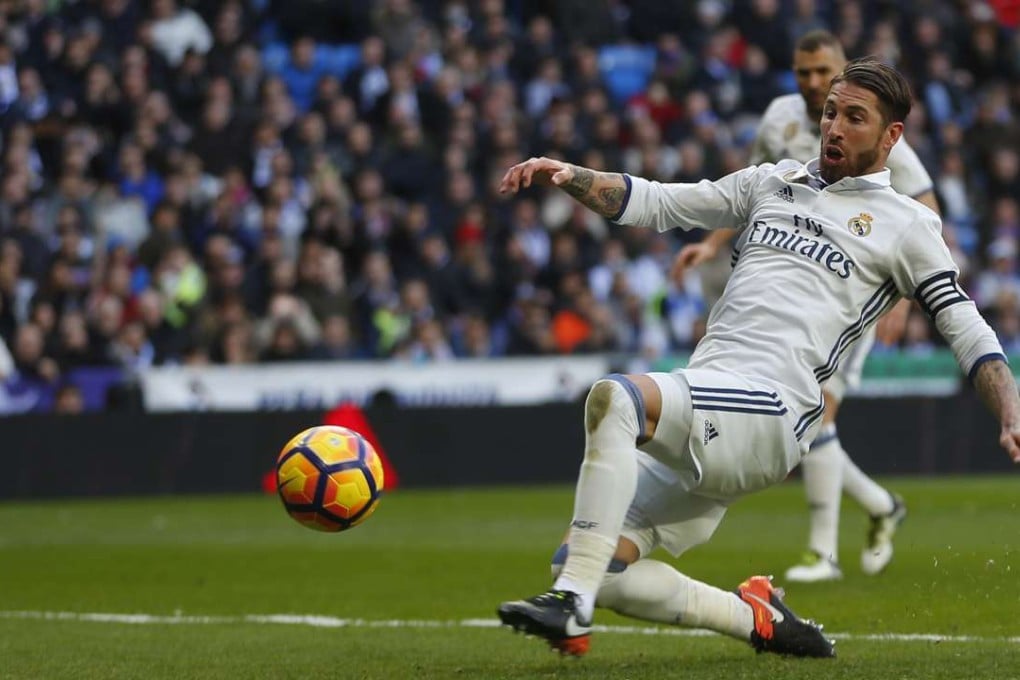Sergio Ramos scores his second goal against Malaga at the Bernabeu. Photo: AP