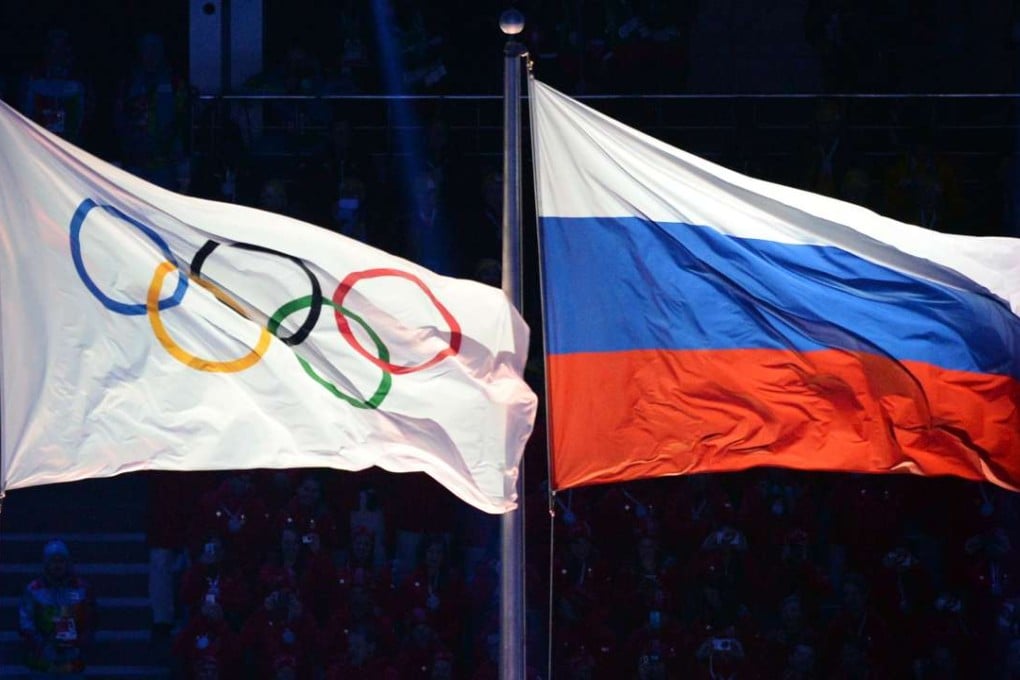 The Olympic and Russian flags. Photo: AFP