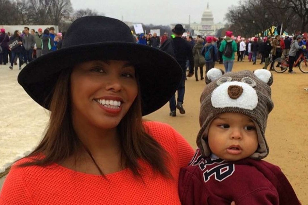 Helen Troncoso, with son Hunter, joined hundreds of thousands of women in an unprecedented wave of mass protests against US President Donald Trump, the day after his inauguration. Photo: Helen Troncoso