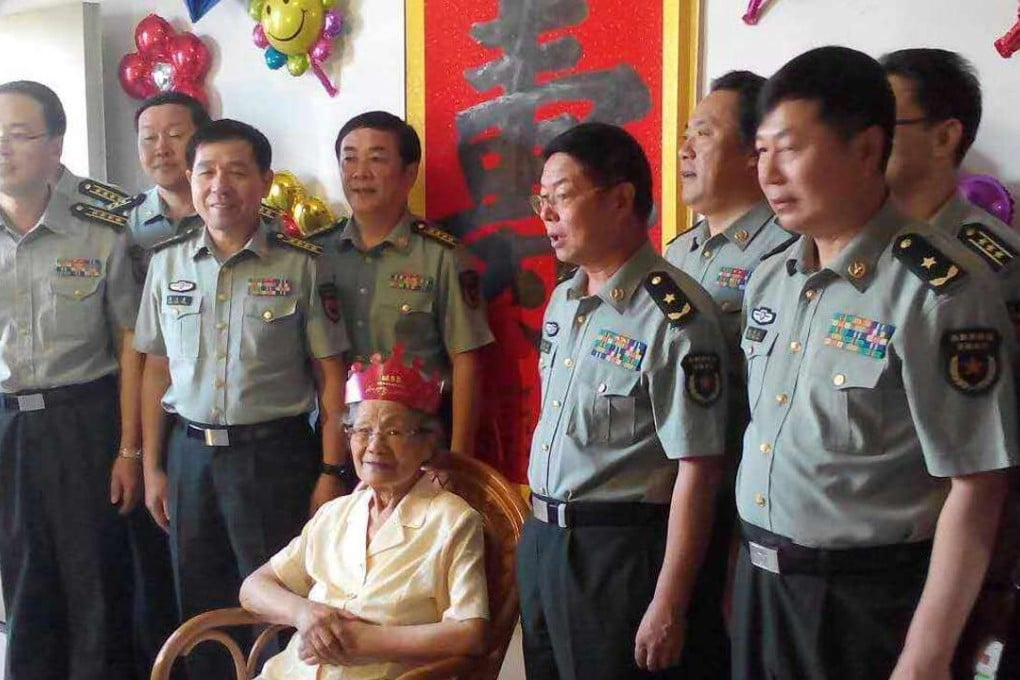 PLA officials at the general hospital celebrate the Yip’s 100th birthday last year. Photo: Handout