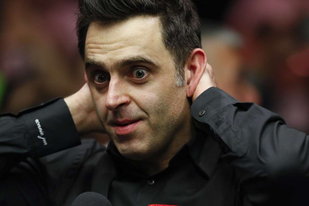 Ronnie O’Sullivan reacts after winning the Masters title at Alexandra Palace in London. Photo: Xinhua