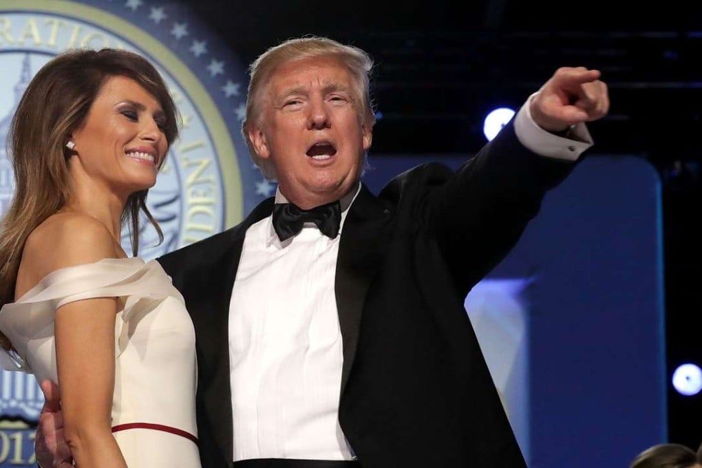 US President Donald Trump and first lady Melania Trump thank guests during the Freedom Ball at the Washington Convention Centre on Friday night. Photo: AFP