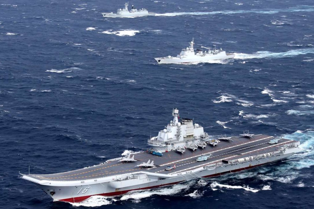 China's Liaoning aircraft carrier with accompanying fleet conducts a drill in an area of South China Sea. File photo: Reuters