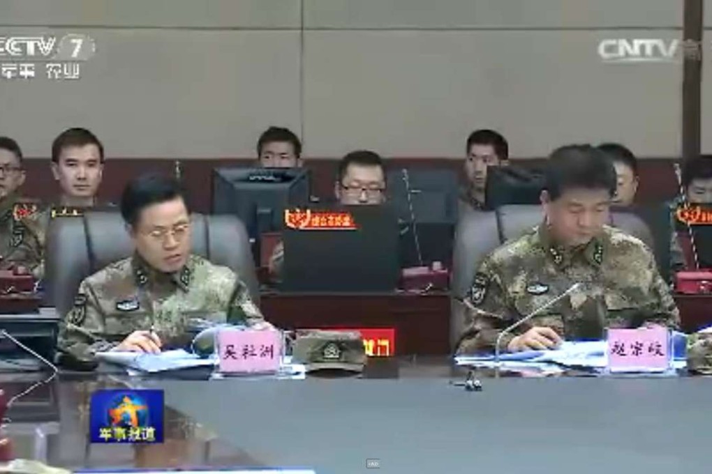 Lieutenant General Wu Shezhou (front left) is seen next to General Zhao Zhongqi for a western command drill broadcast on CCTV on Saturday. Photo: CCTV