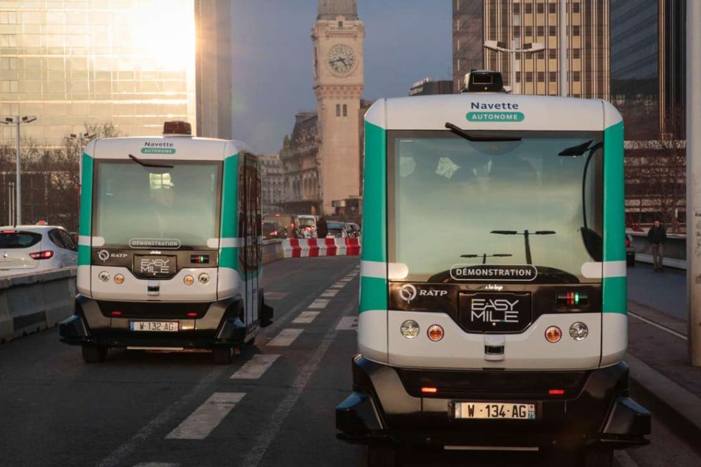 Two self-driving buses travel between Austrelitz station and Lyon station in Paris on Monday. Photo: AFP