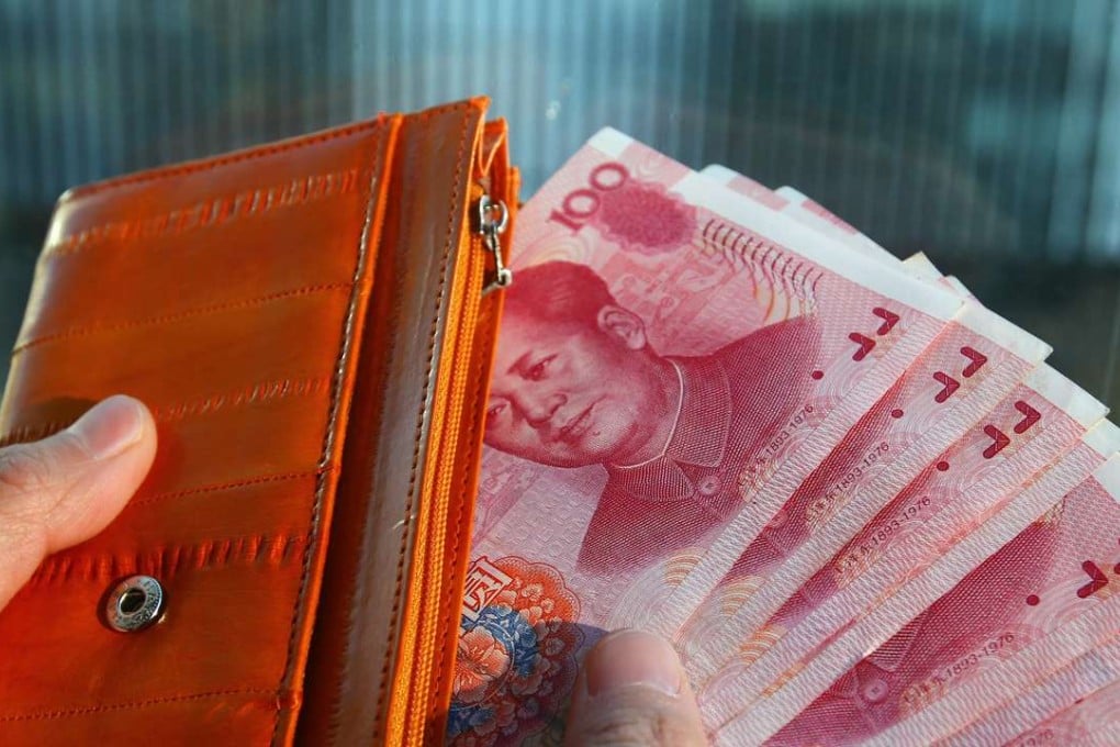 China's 100 yuan bank notes are pictured in Beijing on Nov. 14, 2016. 14NOV16 SCMP/Simon Song