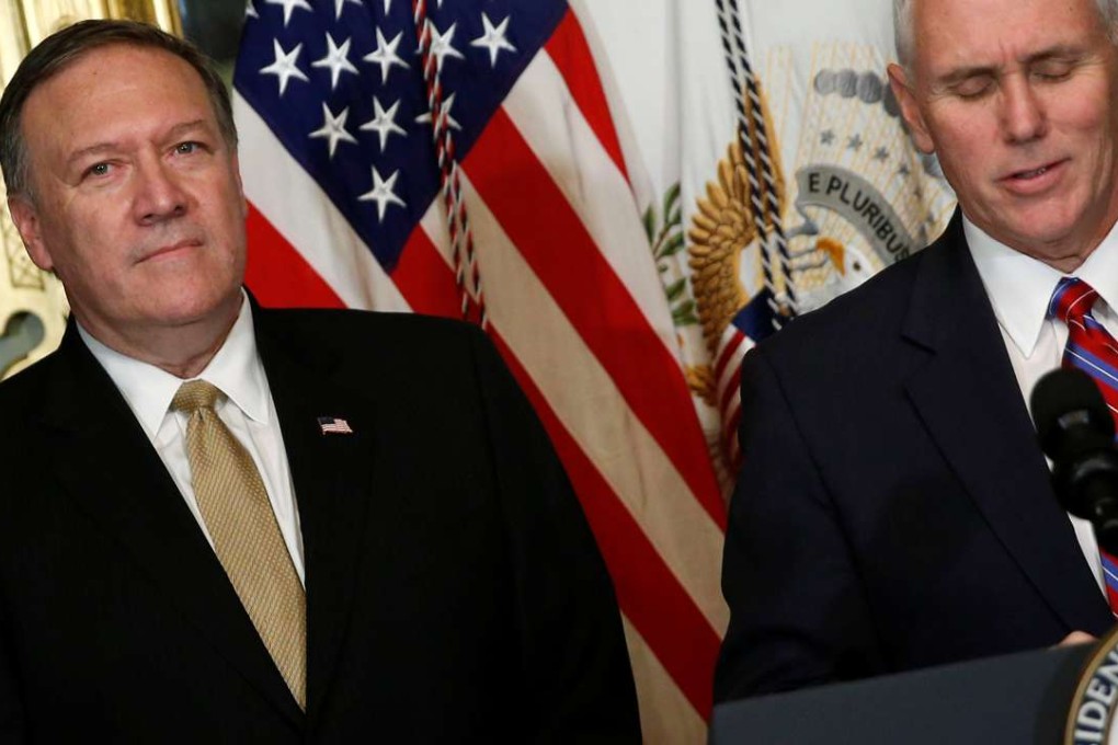 Mike Pompeo (left) listens to remarks by US Vice-President Mike Pence before he is sworn in to be director of the Central Intelligence Agency in Pence's ceremonial office in the Eisenhower Executive Office Building at the White House on Monday. Photo: Reuters