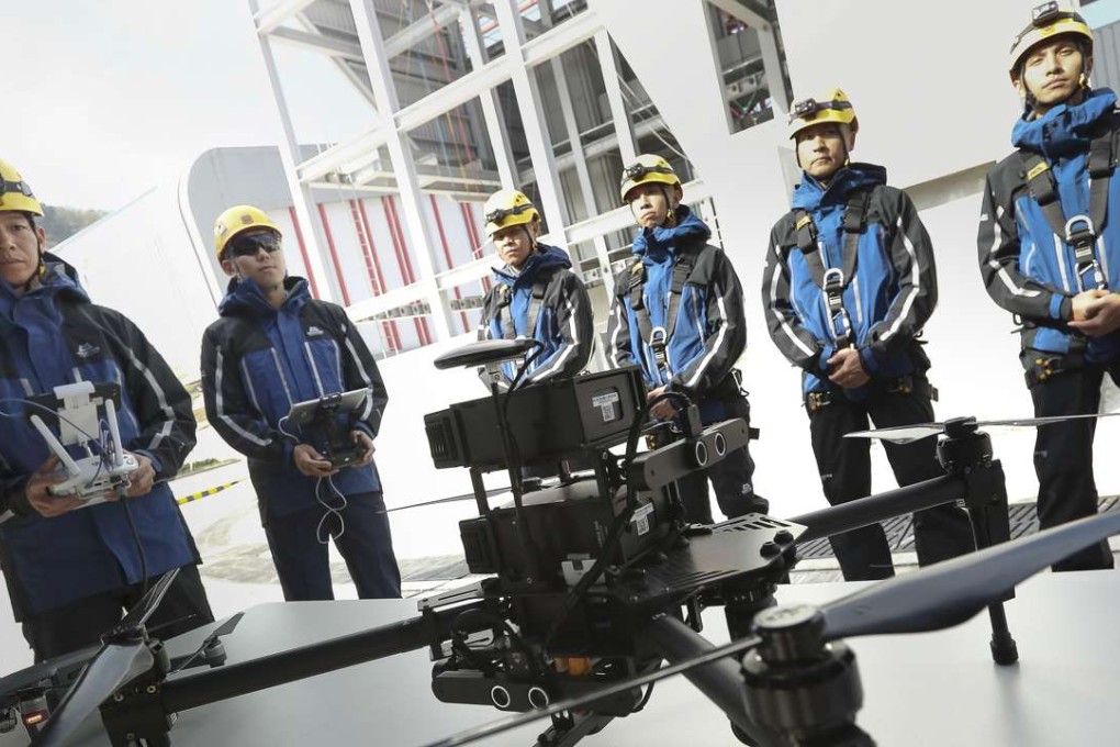 Fire Services Department show off their new drone, part of a Mountain Rescue Support Team. Photo: Nora Tam