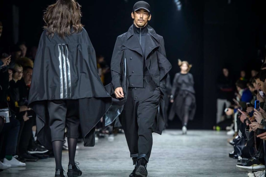 A model parades a Yohji Yamamato design for his Y-3 line on the Paris catwalk. Photo: EPA