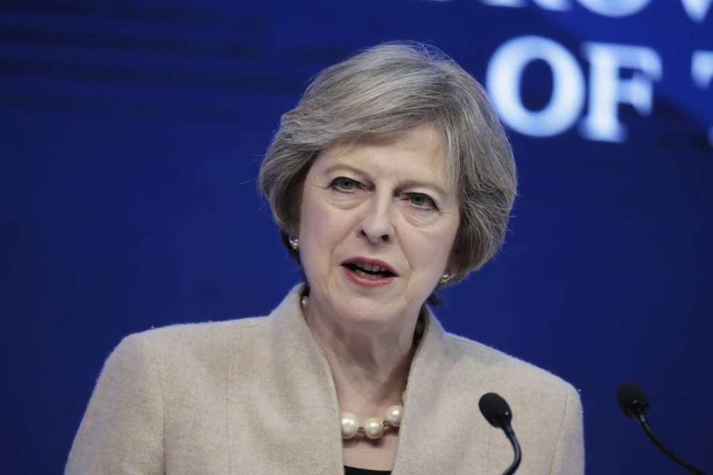 UK Prime Minister Theresa May extolled the virtues of free trade in a speech at Davos. Photo: Bloomberg