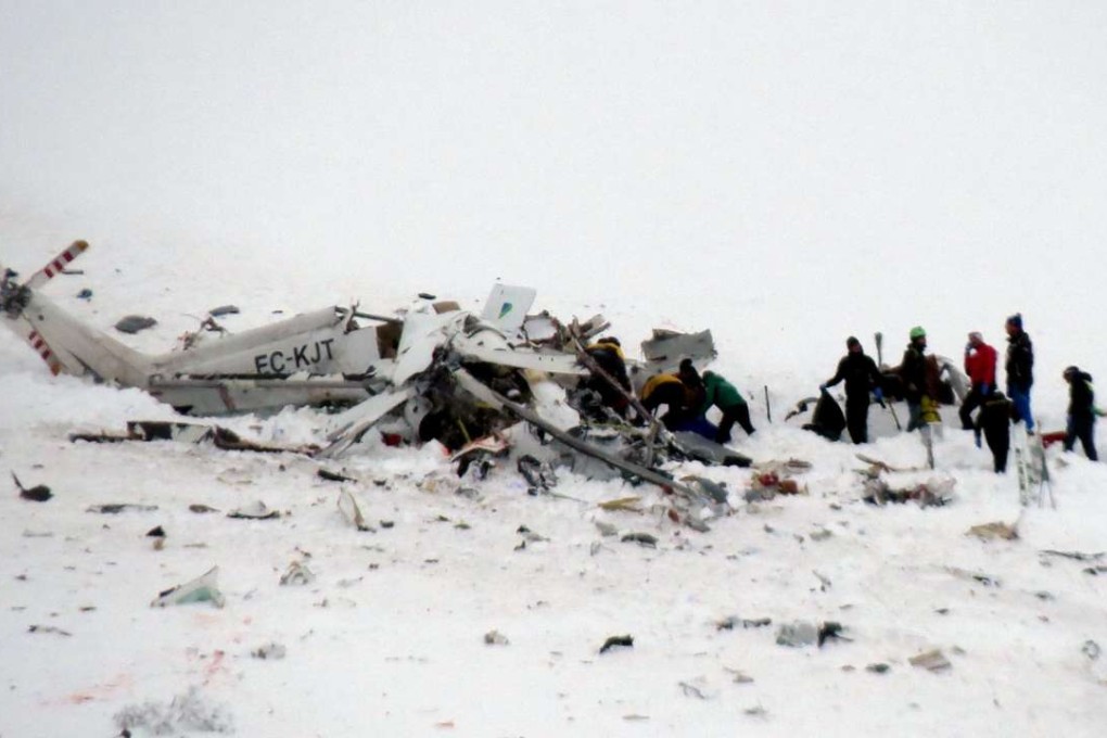 Rescue worker and relief operations at the site of a helicopter crash in Lucoli in Italy’s Abruzzo region, on Tuesday. Photo: EPA