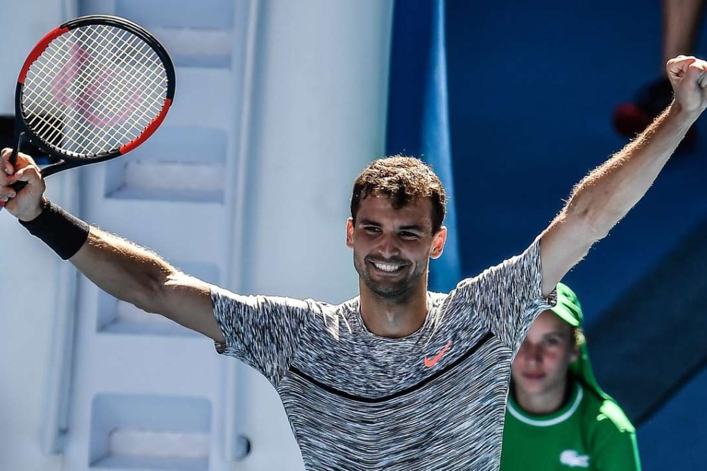Grigor Dimitrov celebrates beating David Goffin in straight sets in the Australian Open quarter-finals. Photo: EPA