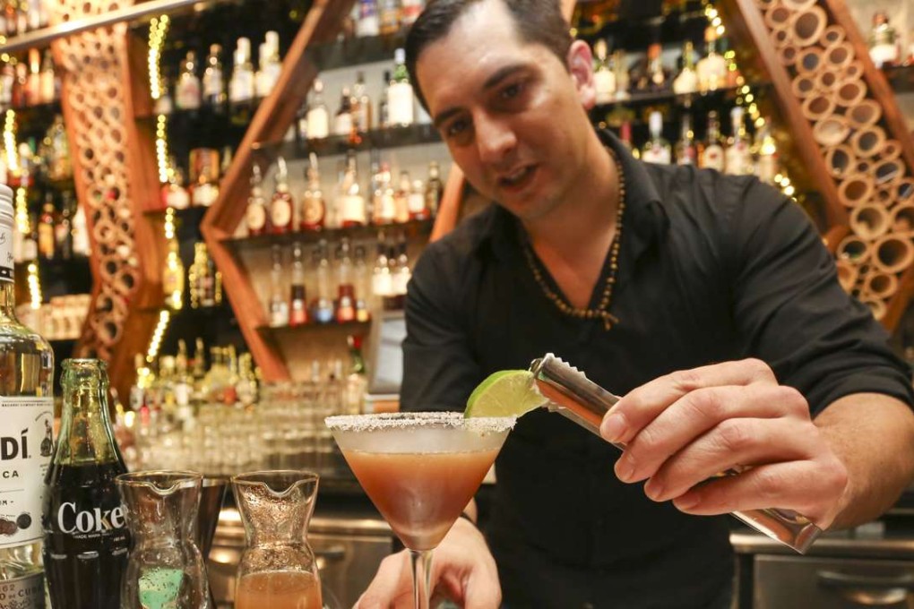 Honi Honi’s Stephane Levan makes a Libertad cocktail. Photos: Jonathan Wong