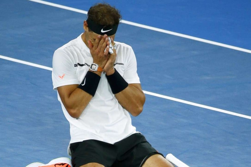 Rafael Nadal was emotional after beating Milos Raonic. Photo: EPA