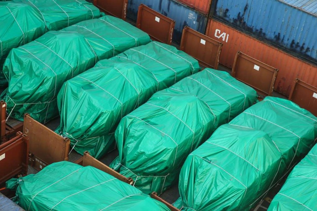The Singaporean military vehicles under cover at the Kwai Tsing Container Terminals. Photo: Sam Tsang