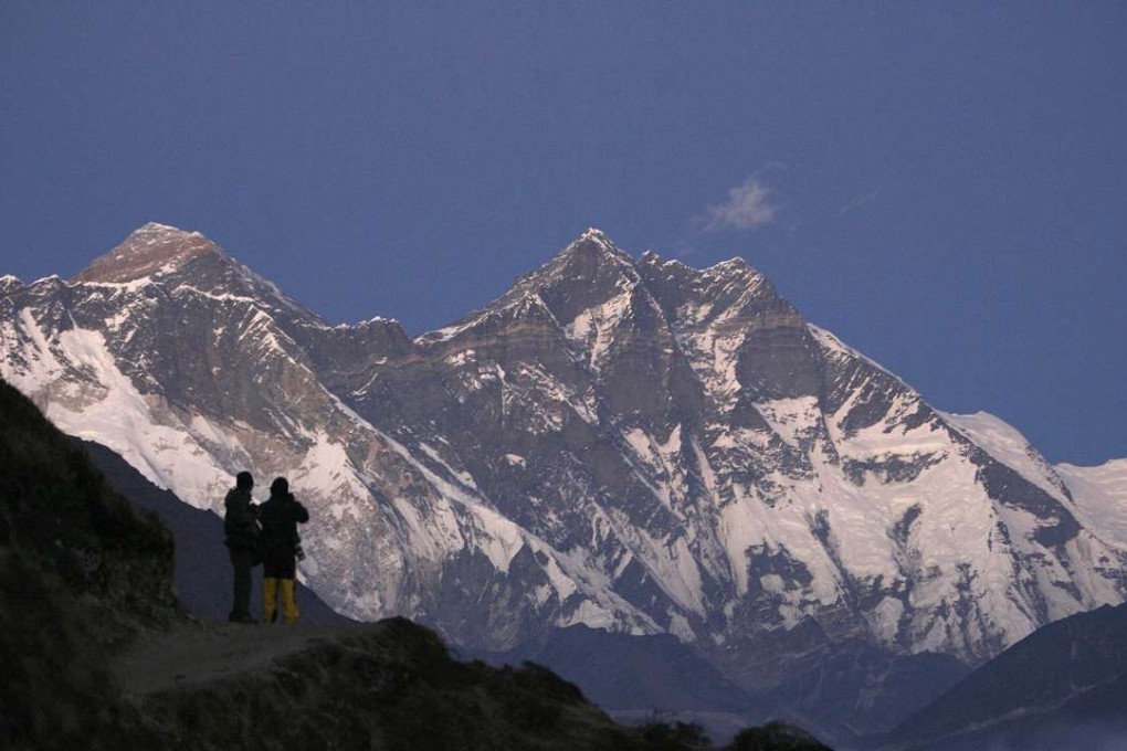 Travellers enjoy a view of Mount Everest at Syangboche in Nepal. File photo: Reuters