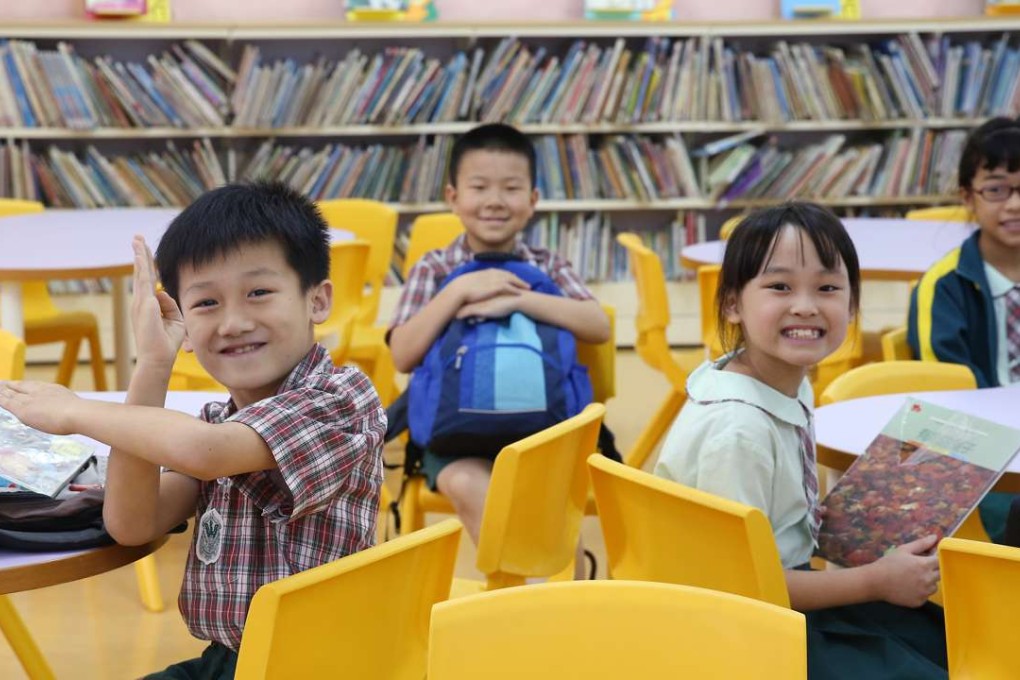Young students at the Fung Kai Liu Yun Sum Memorial School in Fanling, last June 15. Children in today’s Hong Kong are growing up in an entirely different environment and under a different kind of pressure from that faced by their parents. Photo: Sam Tsang