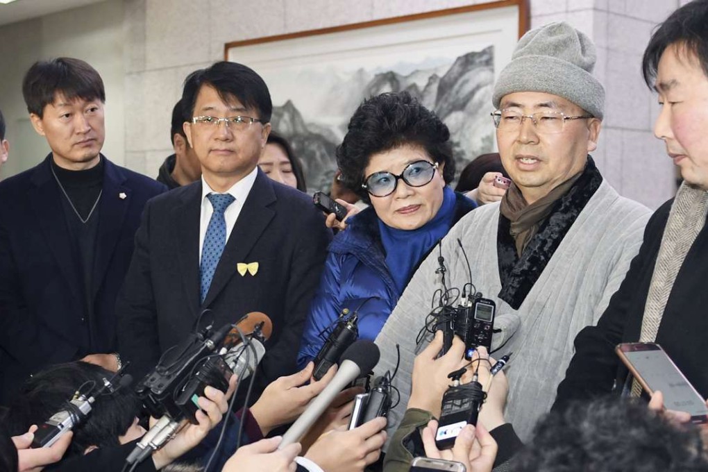 Wonu, chief monk of Buseok temple in Seosan, South Korea, speaks to reporters at the Daejeon District Court. Photo: Kyodo