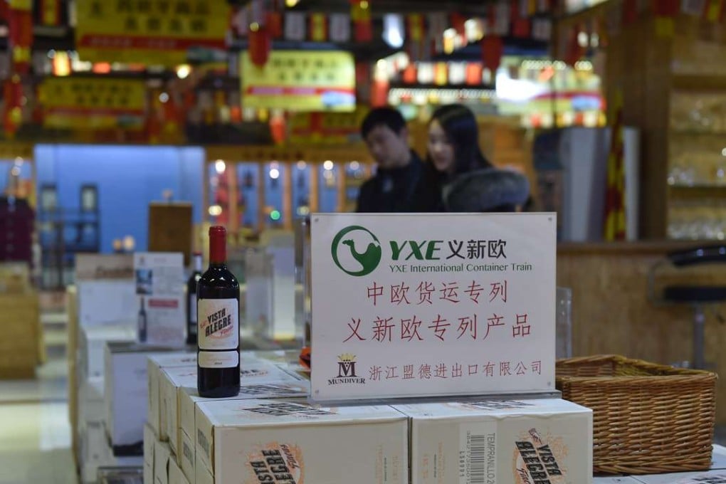 Customers peruse Spanish wines imported by China-Europe container trains. The China-Europe container trains have become a major transportation channel of the international logistics industry, and powerful support for the development of the Belt and Road initiative. Photo: Xinhua