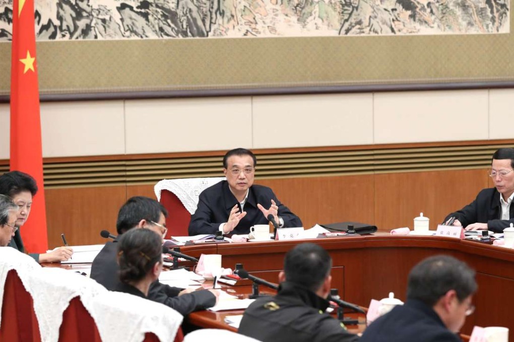 Premier Li Keqiang presides over a seminar to solicit opinions from representatives of education, science and technology, culture, health, sports sectors and of common people on the draft government work report in Beijing on January 16. Photo: Xinhua