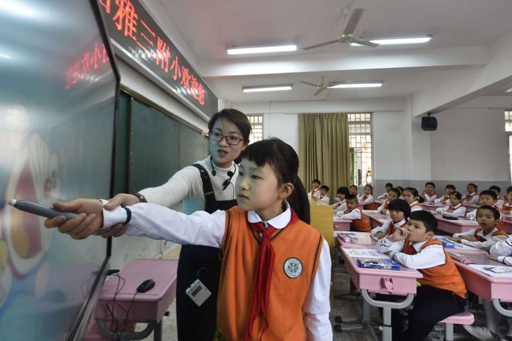 Students get a maths lesson using a cloud teaching platform at an elementary school in Fuzhou, Fujian province, last November. Photo: Xinhua