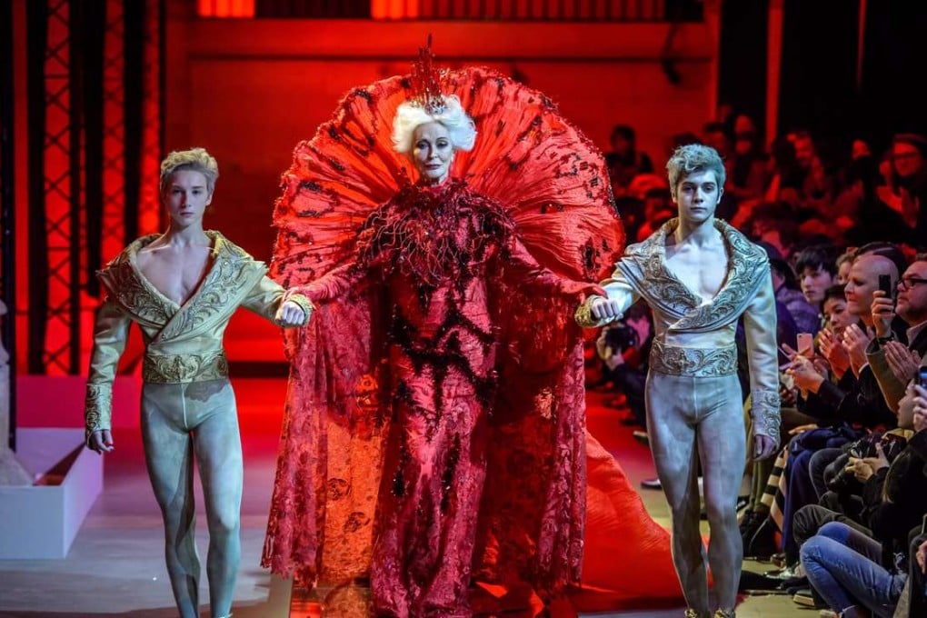 It was almost as if Marie Antoinette had been reincarnated when 83-year-old model Carmen Dell'Orefice presented an ethereal scarlet Guo Pei couture robe handcrafted from metal-woven silk in Paris. Photo: EPATESSON