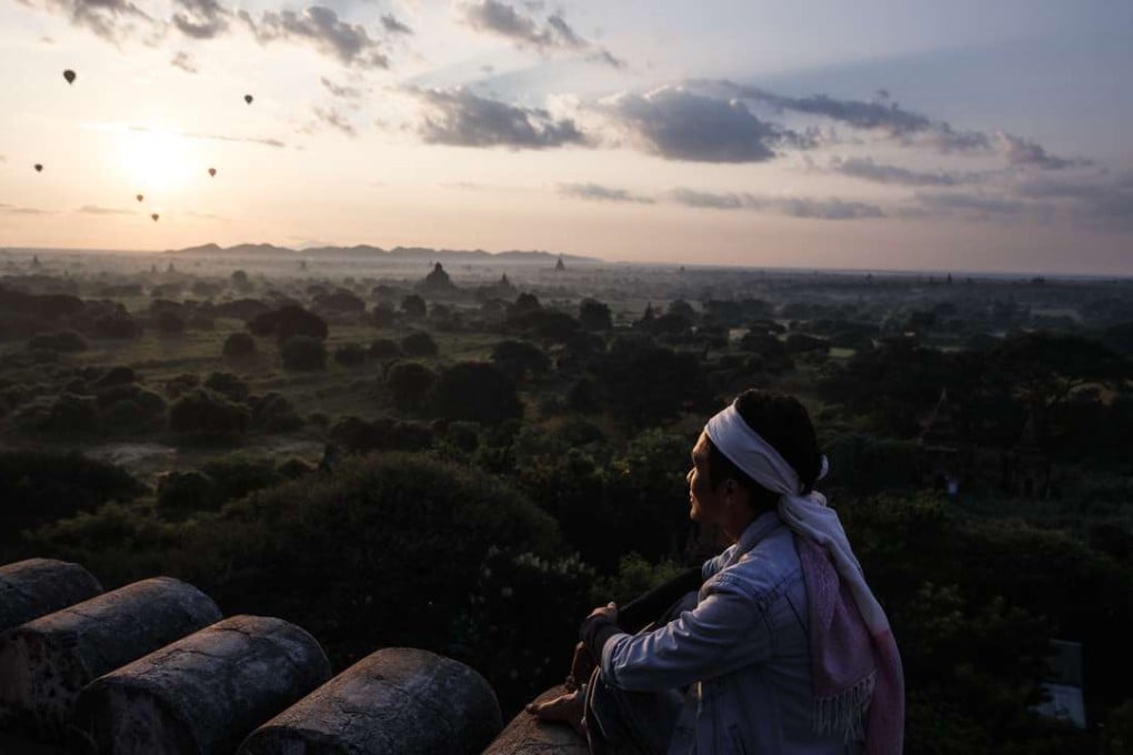 Hot air balloons take tourists on a sunrise tour over Bagan’s ancient temples. Pictures: AFP; Jamie Carter
