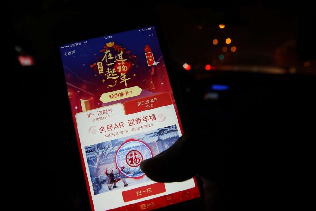 Distributing digital red packets has become a major part of life for mainland Chinese during the week-long holiday for the Lunar New Year. Photo: Simon Song
