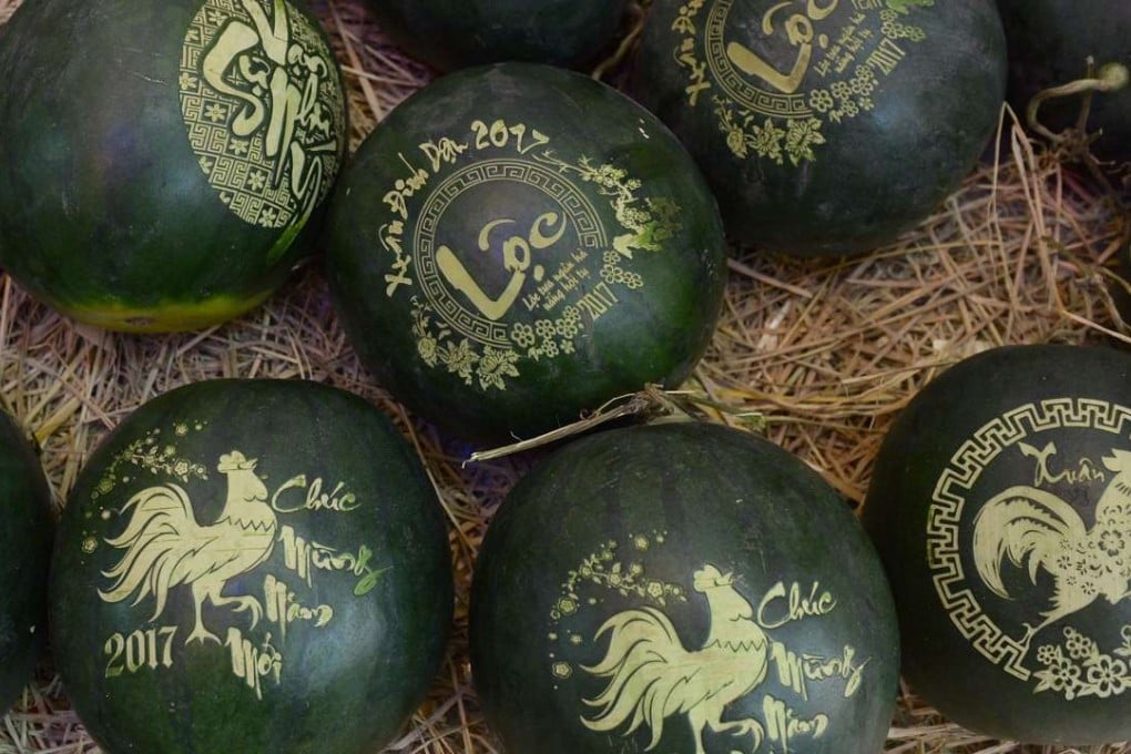Watermelons with laser-carved images on them. Photo: AFP