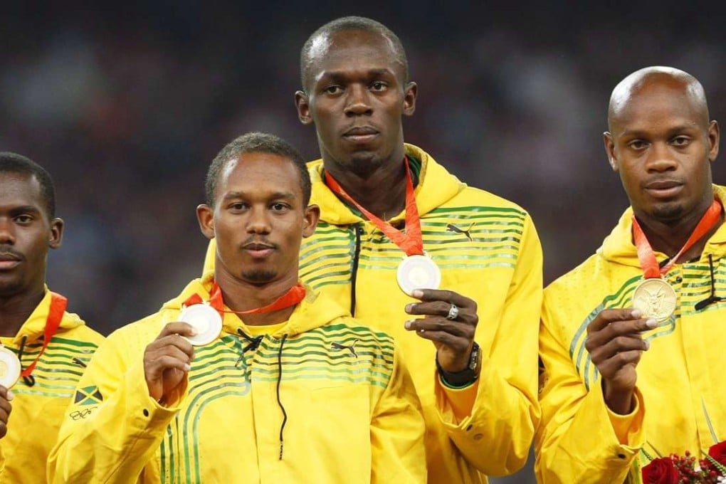 Nesta Carter (left), Michael Frater, Usain Bolt, and Asafa Powell in 2008. Photo: EPA