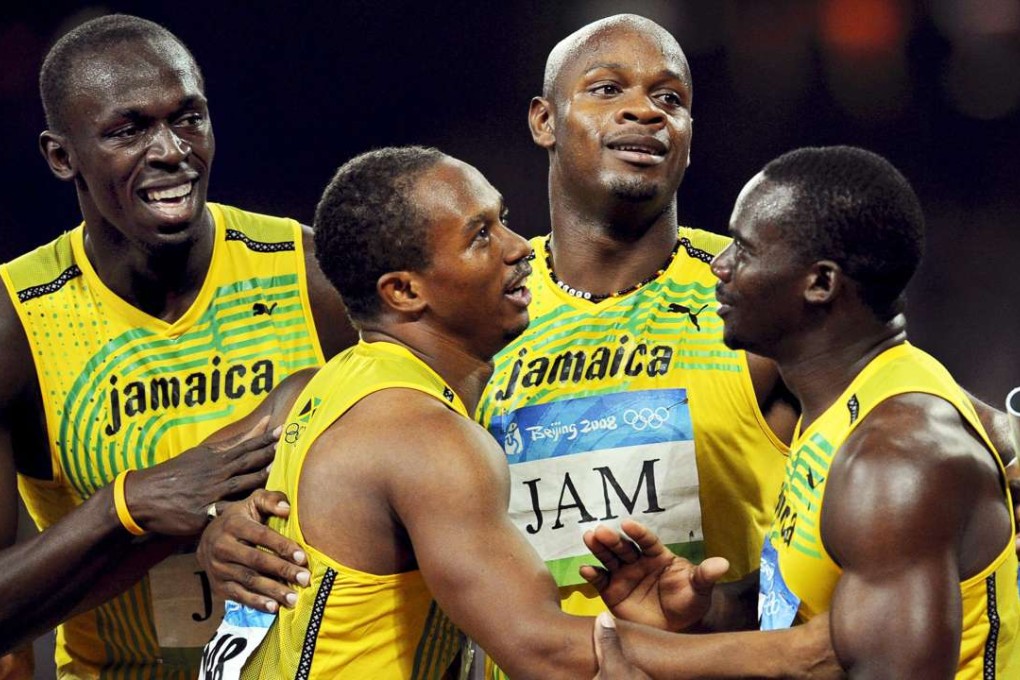 Usain Bolt (left), Michael Frater, Asafa Powell and Nesta Carter celebrating after winning the 4x100m relay final at the Beijing 2008 Olympic Games. Photo: EPA