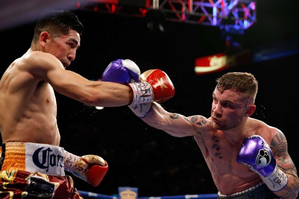 Carl Frampton and Leo Santa Cruz battle during their WBA featherweight title fight at MGM Grand in Las Vegas. Photo: AFP
