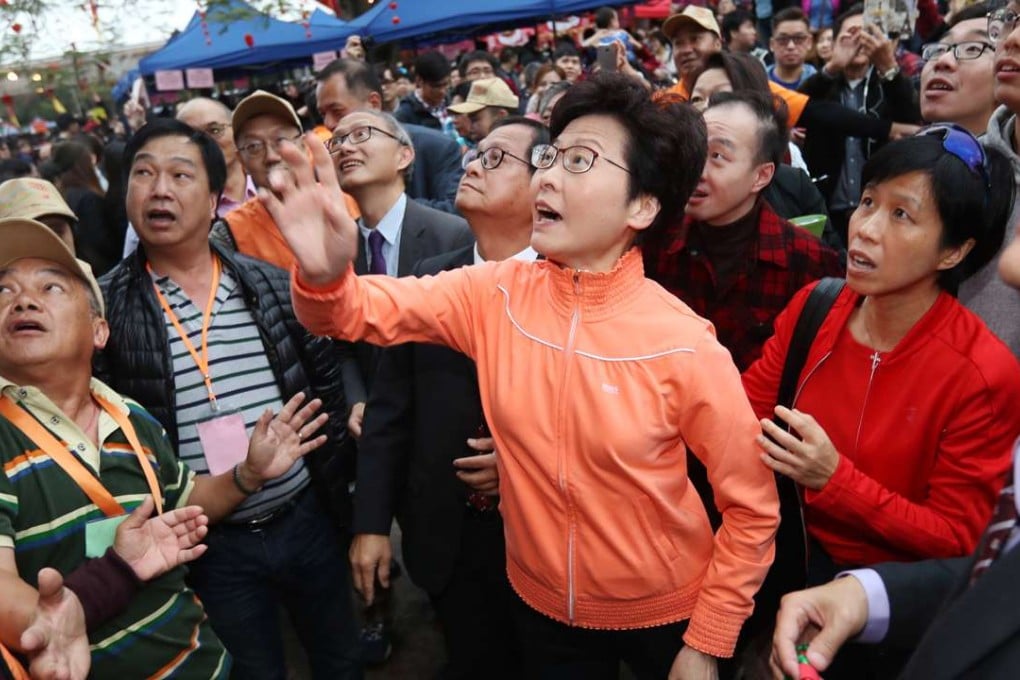 Carrie Lam at the Well-wishing Festival in Lam Tsuen. Her gaffes, involving a beggar and an apparent inability to use the MTR, had drawn criticism. Photo: Nora Tam