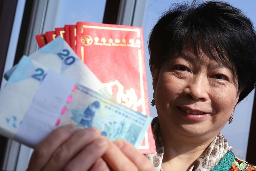 Lydia Yip Siu-Ming, head of the currency and settlement division in the financial infrastructure department of the HKMA, encourages the use of recycled banknotes for lai see. Photo: Dickson Lee