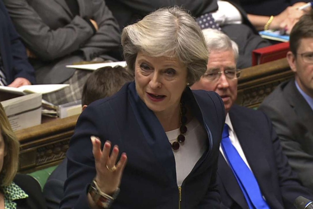 British Prime Minister Theresa May answers questions in the House of Commons. Photo: AFP
