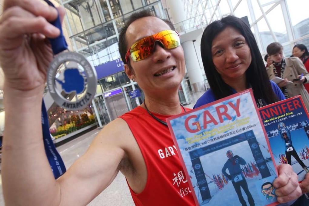 Gary Leung (left) and Jennifer Cheung arrive to a heroes’ welcome at the airport. Photo: David Wong