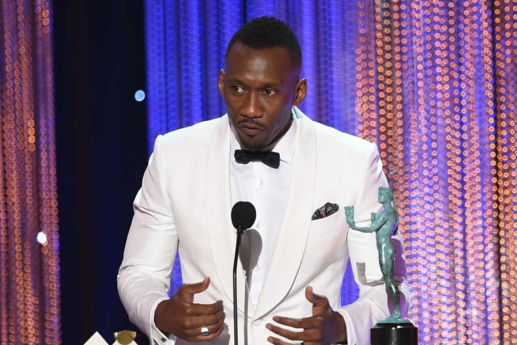 Actor Mahershala Ali accepts his award for Outstanding Performance by a Male Actor in a Supporting Role for Moonlight during the 23rd Annual Screen Actors Guild Awards show at The Shrine Auditorium on Sunday in Los Angeles. Photo: AFP