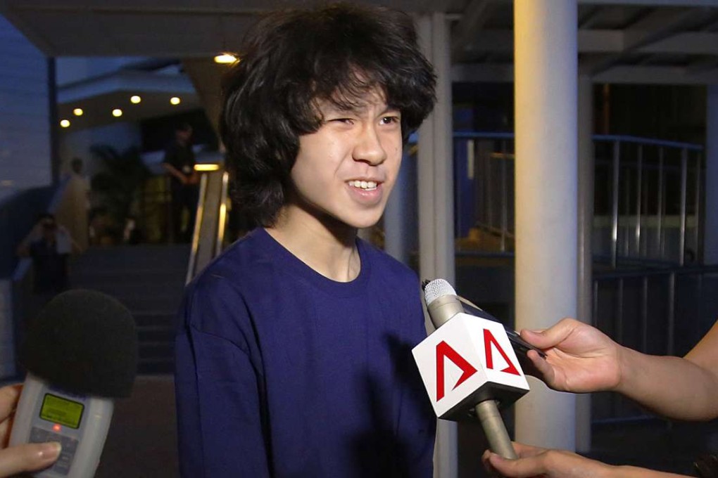 In this Tuesday, May, 12, 2015, file photo, Singapore teen blogger Amos Yee speaks to reporters while leaving the Subordinate Courts after being released on bail in Singapore. Yee has been detained in the US where he is seeking asylum. Photo: AP