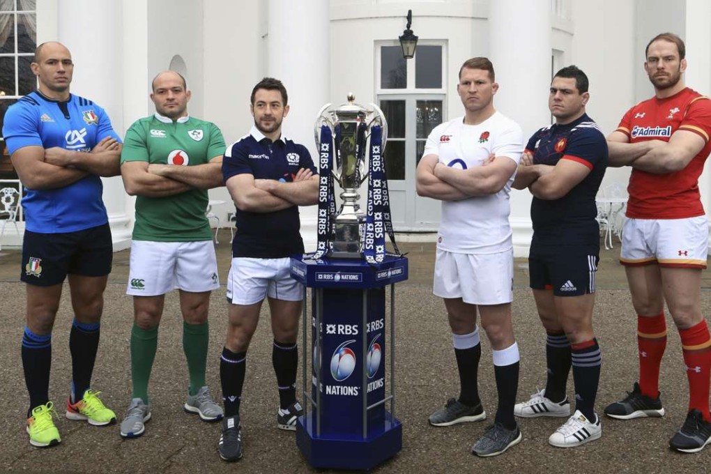 (From left to right) Italy captain Sergio Parisse, Ireland captain Rory Best, Scotland captain Greig Laidlaw, England captain Dylan Hartley, France captain Guilhem Guirado and Wales captain Alun Wyn Jones pose next to the Six Nations Championship trophy. Photo: AP