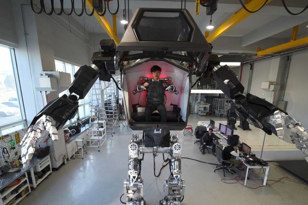 Engineers test a humanoid manned robot dubbed Method-2 at Hankook Mirae Technology in Seoul, South Korea. The reason for automating rather than going with human labour is to lower the costs of production. Photo: AFP