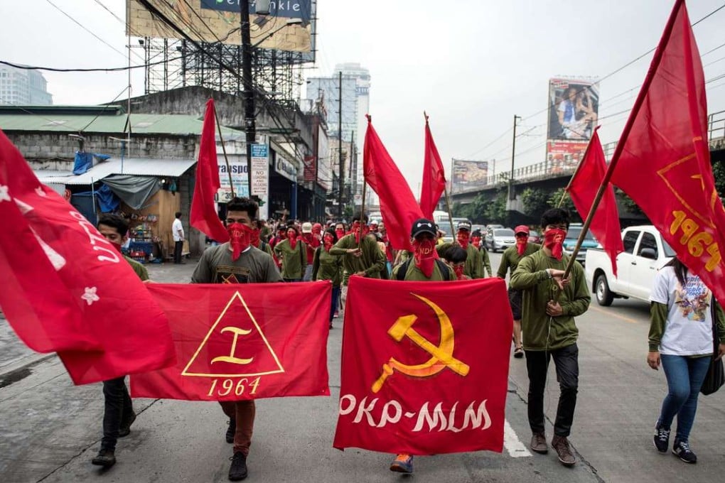 Members of the National Democratic Front of the Philippines. The communists have been waging a ‘national democratic revolution’ since 1968 to overthrow a capitalist system that has created one of Asia's biggest rich-poor divides and claimed 30,000 lives, according to the military. Photo: AFP