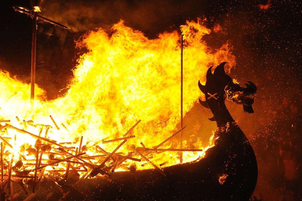 Participants dressed as Vikings burn their viking galley ship at the culmination of the annual Up Helly Aa festival in Lerwick, Shetland Islands. Photo: AFP