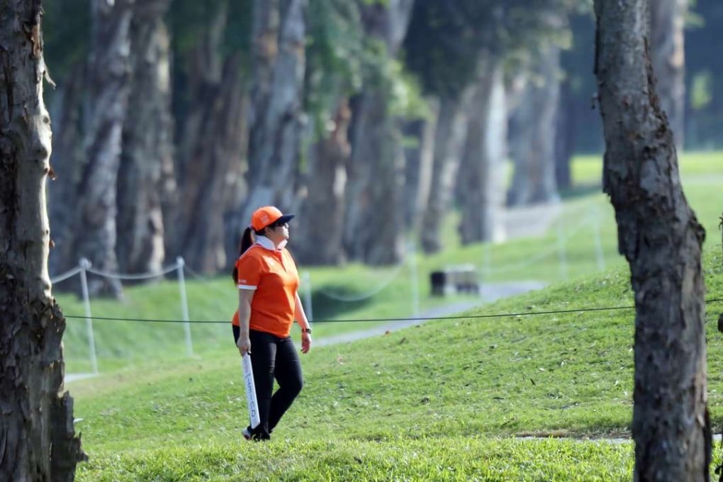A staff member walks around the Fanling course during the Hong Kong Open golf tournament in 2015. Photo: Edward Wong