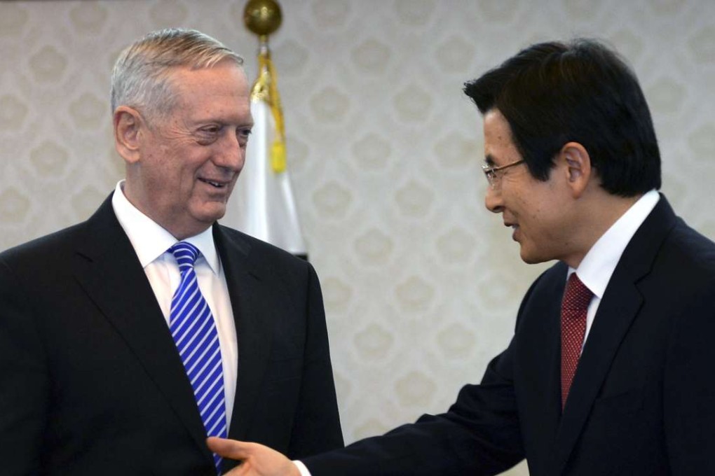 US Defence Secretary James Mattis is welcomed by acting president Hwang Kyo-ahn in Seoul, for the first foreign visit by a member of Donald Trump’s cabinet. Photo: EPA