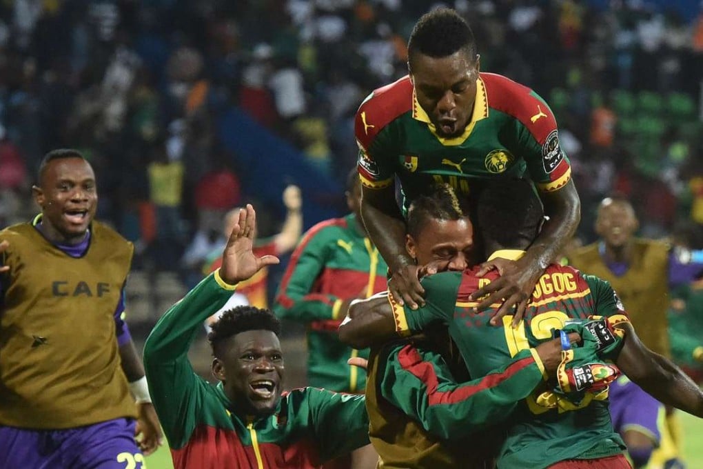 Cameroon players celebrate their second goal during the 2017 Africa Cup of Nations semi-final match against Ghana. Photo: AFP