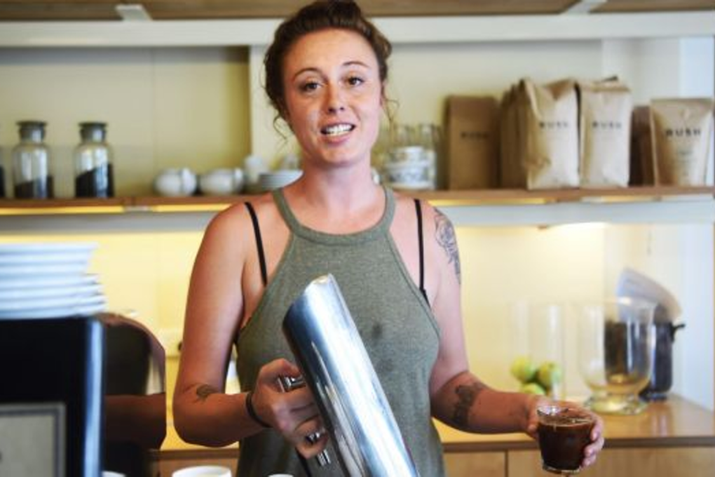 Kat Shen has suffered back pain since giving birth to her son Alexander four years ago. Photo: Nick Moir/Fairfax