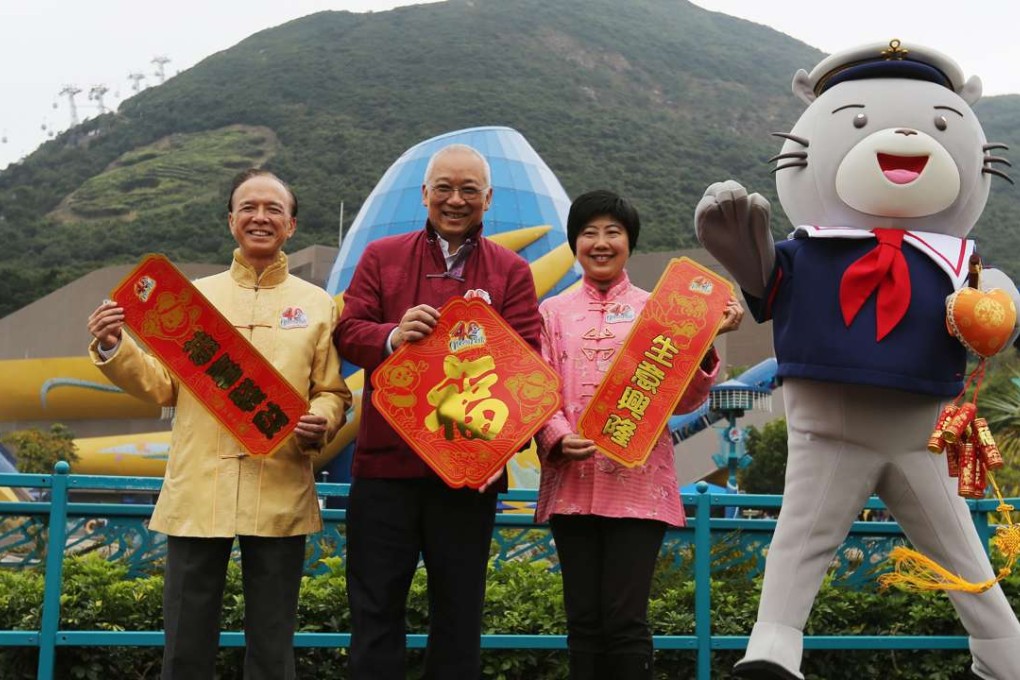 Matthias Li Sing-chung, chief executive of Ocean Park (left), chairman Leo Kung Lin-cheng (centre), and Vivian Lee Ling-fung, executive director of sales and marketing, announced the growth in visitor numbers on Thursday. Photo: Xiaomei Chen