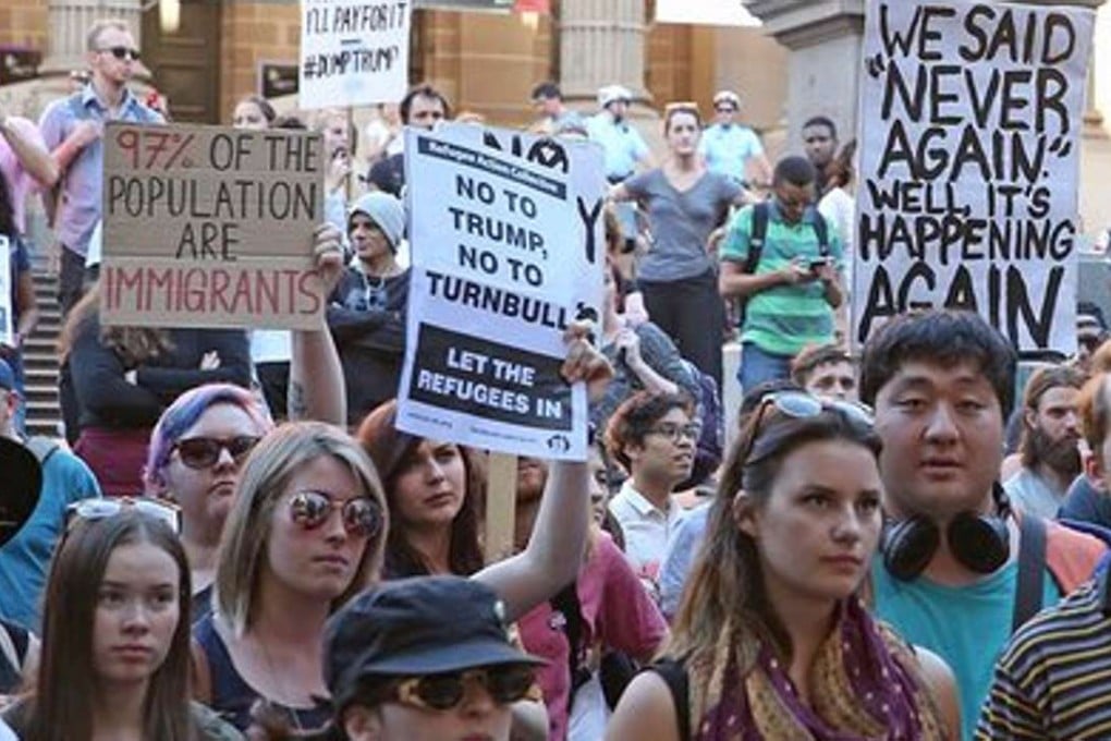 Thousands of protesters rallied across Australia on Saturday condemning US President Donald Trump’s order temporarily barring refugees . Photo: The Guardian