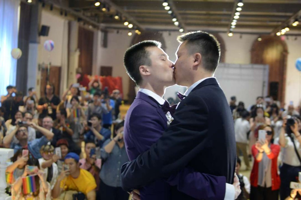 Sun Wenlin and his partner Hu Mingliang at their wedding ceremony in Changsha, Hunan province in May last year. Photo: Reuters